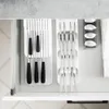 A drawer with cutlery organizers and utensils. Anteprima dell’immagine prodotto