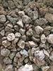 A close-up, overhead view of a pile of lava rocks. Produktbild-Vorschau