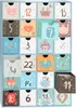 A close-up view of a light blue advent calendar with 24 drawers, each decorated with a different animal and number. Náhľad obrázku produktu