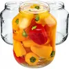 Three glass jars, one filled with colorful mini peppers, are shown against a white background. Podgląd zdjęcia produktu