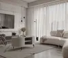 A modern living room with a curved sofa, coffee table, and sheer curtains. Produktbild-Vorschau