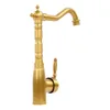 A golden faucet on a white background. Podgląd zdjęcia produktu
