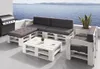 Outdoor patio furniture set with a grill and a view of the ocean. Produktbild-Vorschau