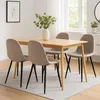 A dining set with a wooden table and four chairs in a well-lit room. Anteprima dell’immagine prodotto
