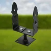 A black metal post bracket is shown against a blurred background of green grass and a blue sky. Produktbild-Vorschau