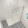 A modern bathroom with a walk-in shower. Produktbild-Vorschau