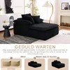 An instructional image showing the unpacking and setup process of a black sofa. Náhled obrázku produktu