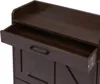 A close-up view of a dark brown wooden cabinet with an open drawer. Podgląd zdjęcia produktu