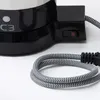 A close-up view of the base of a black coffee maker with a power cord coiled in the foreground. Náhľad obrázku produktu