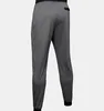 The back view of a pair of gray joggers with black accents. Produktbild-Vorschau