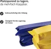 Two folded items, one blue and one yellow, are shown in the foreground. Text describes features of the product. Náhľad obrázku produktu