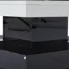 A close-up view of a modern coffee table with a white top and black base. Produktbild-Vorschau