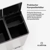 Close-up view of a silver and black kitchen compost bin with its lid open, revealing two compartments and a smaller removable compost container inside. Text and a logo are present on the right side of the image. Produktbild-Vorschau