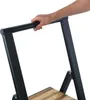 A hand is gripping the handle of a step stool. Podgląd zdjęcia produktu