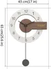 A wall clock with dimensions indicated. Produktbild-Vorschau