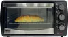 A toaster oven with a croissant inside. Náhľad obrázku produktu