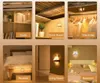 Collage of images showing a small LED night light in various settings like a study, dorm room, wardrobe, bedside, living room, and bedroom. Produktbild-Vorschau