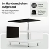 An exploded view diagram of a black and white coffee table with silver metal legs and supports, showing its assembly components and included storage bag. Produktbild-Vorschau