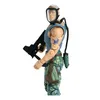 A side view of an action figure of Colonel Miles Quaritch from Avatar, holding a rifle and wearing a gas mask and camouflage pants. Produktbild-Vorschau