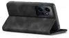 A black flip case for a smartphone is shown from a diagonal angle, with the front cover open. Produktbild-Vorschau