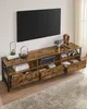 A television stand with a mounted TV above it. Náhled obrázku produktu
