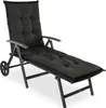 A studio shot of a dark gray chaise lounge with a thick cushion, shown from a three-quarter angle against a white background. Produktbild-Vorschau