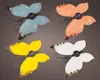 Four solar-powered butterfly lights in different colors. Podgląd zdjęcia produktu