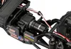 Close-up view of the motor and electronic speed controller (ESC) of an RC car. Produktbild-Vorschau