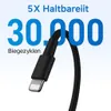 Close-up of a black charging cable connector with text overlay highlighting durability. Produktbild-Vorschau