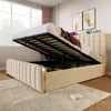 A bed with its storage compartment open, showing the mattress and bedding, in a bedroom setting. Produktbild-Vorschau