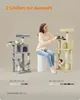 A woman is sitting next to two cat trees, one gray and one beige, with cats on them. Produktbild-Vorschau