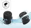 Two black Bluetooth speakers are shown partially submerged in water, with water splashing around them. Náhled obrázku produktu