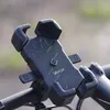 A black Vayox phone holder is mounted on a bicycle handlebar. Anteprima dell’immagine prodotto