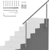 A stainless steel handrail installed on a set of stairs, with various mounting hardware and tools shown in the upper left corner. Podgląd zdjęcia produktu