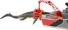 A toy Mosasaurus being lifted by a crane from a toy boat. Náhľad obrázku produktu