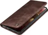A brown leather flip case for a smartphone is shown from a diagonal angle, with the phone partially visible inside. Produktbild-Vorschau