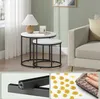 A collage of images showing nesting tables, table legs, and a cleaning cloth with water droplets. Produktbild-Vorschau