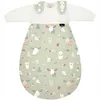 A baby sleeping bag with a white top and a green patterned bottom featuring various forest animals. Produktbild-Vorschau