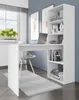 A white desk with shelves is shown in a room with blue walls and a window. Voir les images du produit