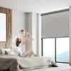 A mother is playing with her baby on a bed in a bedroom. Náhled obrázku produktu