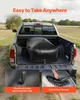 A black water storage bladder is loaded into the bed of a pickup truck, with text overlays highlighting its portability and storage features. Náhled obrázku produktu
