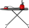 A red and black ironing station with a steam generator and iron on a gray ironing board, set against a white background. Produktbild-Vorschau