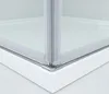 A close-up view of the corner of a shower enclosure, showing the frame and glass. Produktbild-Vorschau