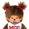 Close-up of a Monchhichi doll wearing a cheerleader outfit. Produktbild-Vorschau