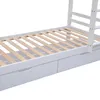 A close-up view of the lower section of a white bunk bed, showing the wooden slats of the mattress base and two drawers underneath. Anteprima dell’immagine prodotto