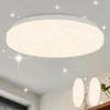 A modern, round LED ceiling light with a starry sky effect, shown mounted on a white ceiling. Two smaller, similar lights are visible in the background. Produktbild-Vorschau