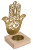 Porte-bougies en métal doré avec pied en bois Voir les images du produit 2