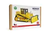 The image shows the packaging of a Merkur bulldozer construction toy. Anteprima dell’immagine prodotto