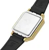 The back of a gold-colored digital watch with a black strap. Anteprima dell’immagine prodotto