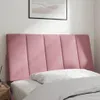A close-up view of a pink velvet headboard for a bed. Produktbild-Vorschau